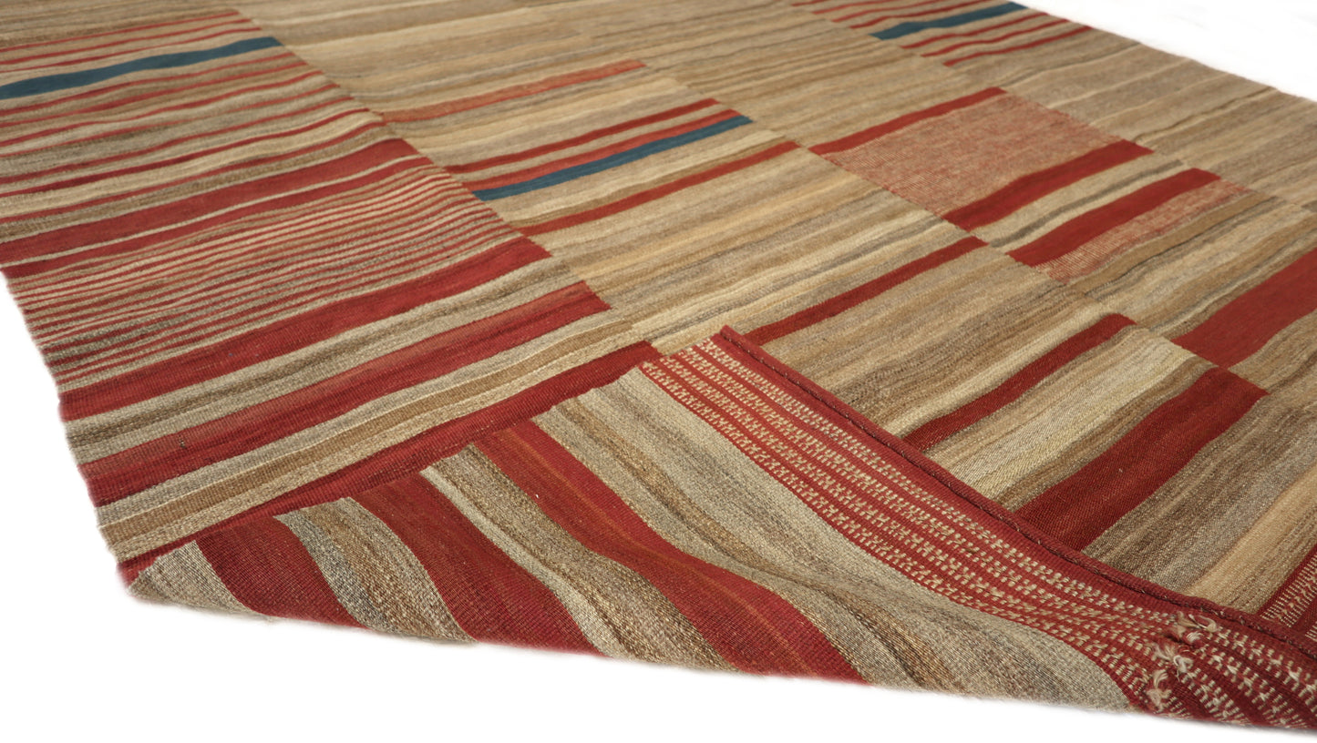 Handwoven Kilim Rug,woven in panels then woven together, beige red blue brown and ivory