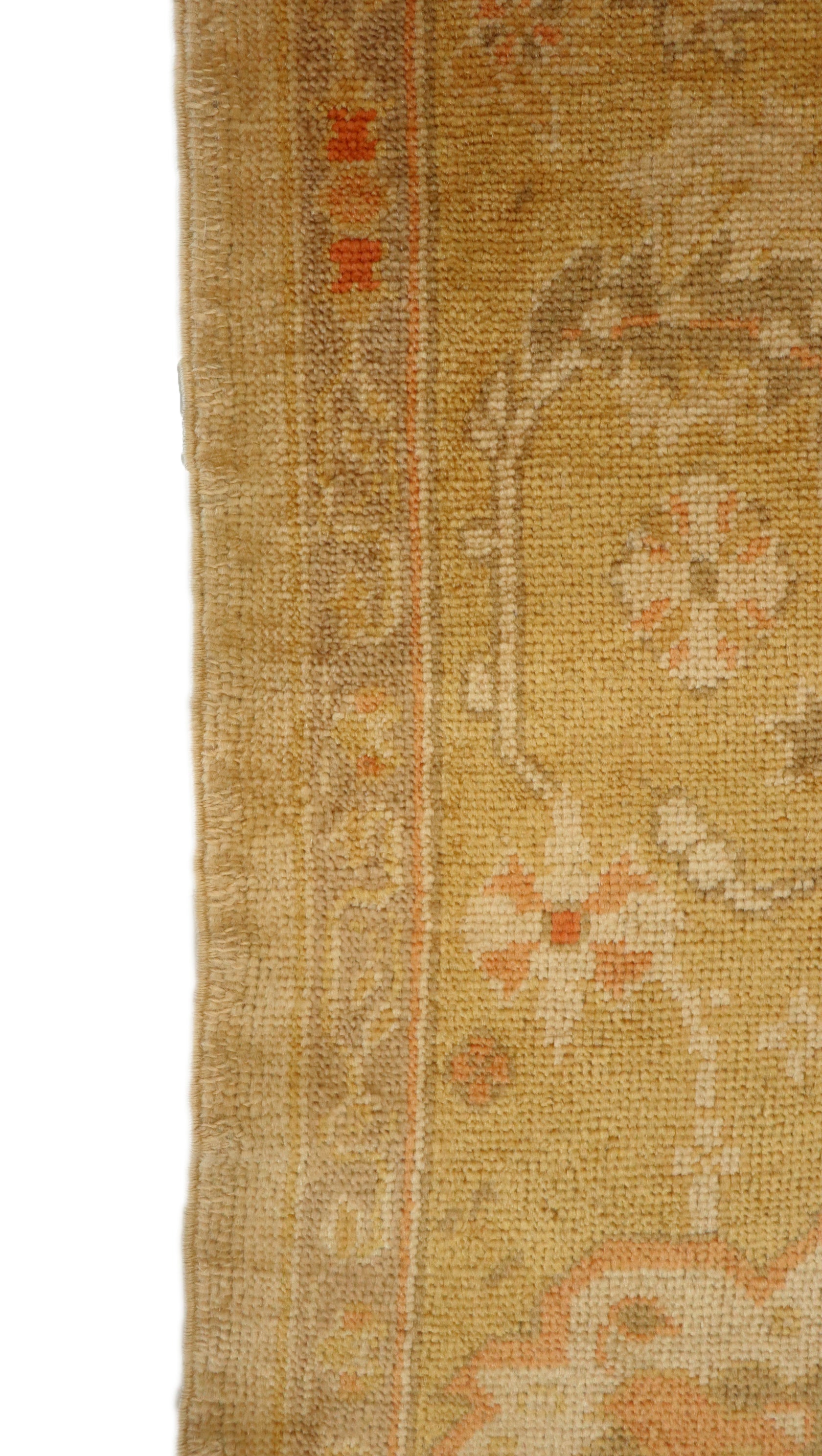 Hand-knotted mohair rug with a large knot and antique finish in oyster shell and sandy beige with dune grass green, rosehip pink, and gold accents.
