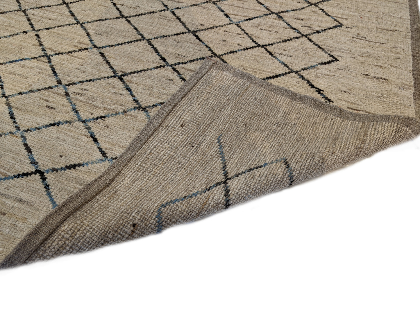 A hand-knotted wool rug with a geometric pattern in beige, brown, blue,  and gray tones, featuring a coastal aesthetic. Cozy pile. 