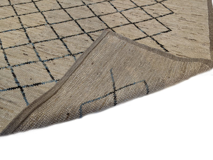 A hand-knotted wool rug with a geometric pattern in beige, brown, blue,  and gray tones, featuring a coastal aesthetic. Cozy pile. 