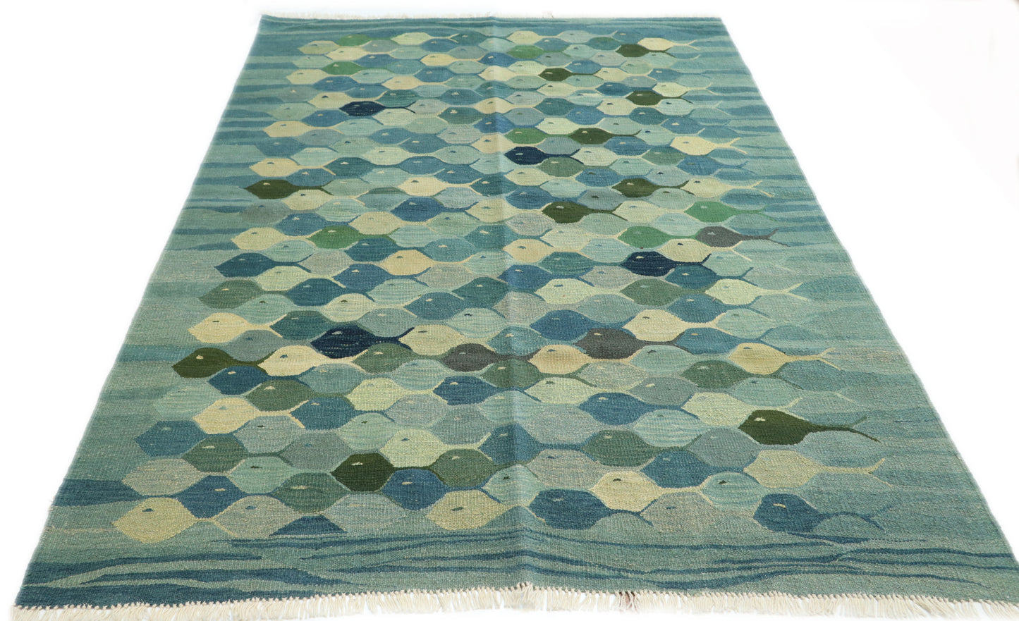 Hand-knotted wool kilim flatweave with a fish design in deep ocean blue, cerulean, and mangrove green.