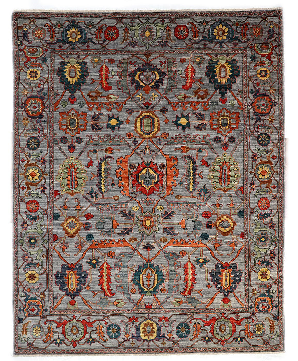 Transitional hand-knotted rug in muted gray-blue with faded coral red, soft orange, and sandy ochre accents.