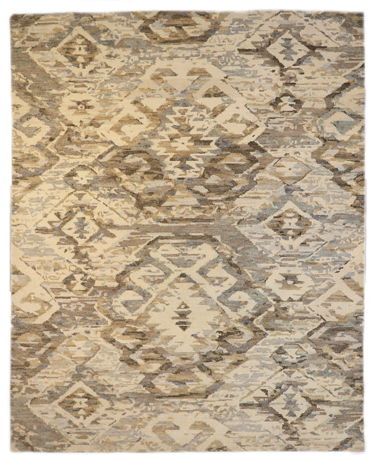 Hand- knotted patterned rug with geometric design in beige, brown, and gray tones. Cozy pile 