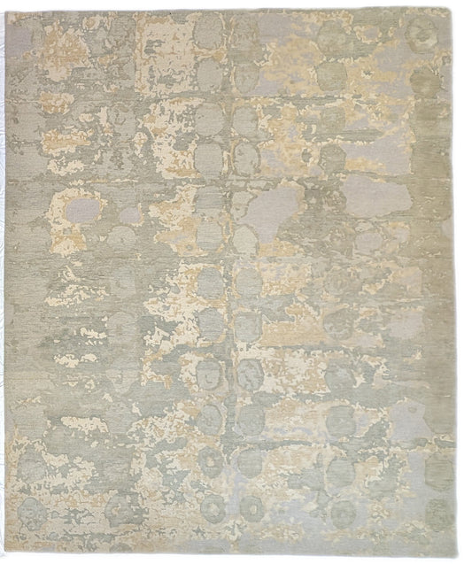 A hand-knotted wool and silk rug featuring a coastal aesthetic with serene coastal tones.