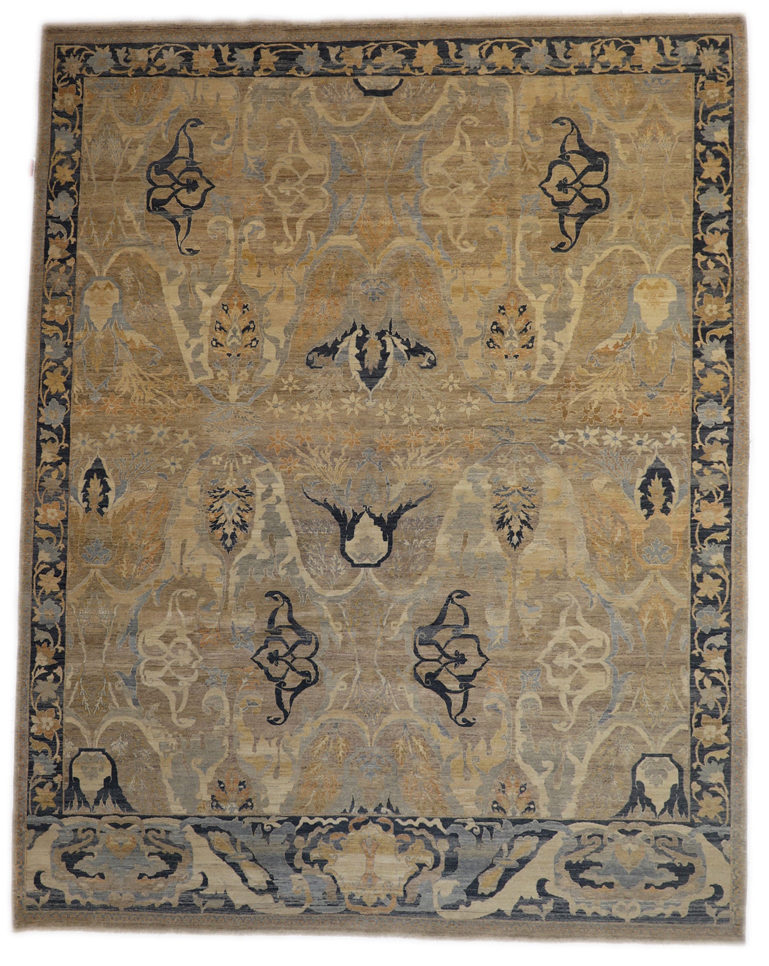 A hand-knotted wool rug with a coastal design featuring navy, ivory, sandy taupe, blue, peach, and yellow colors.