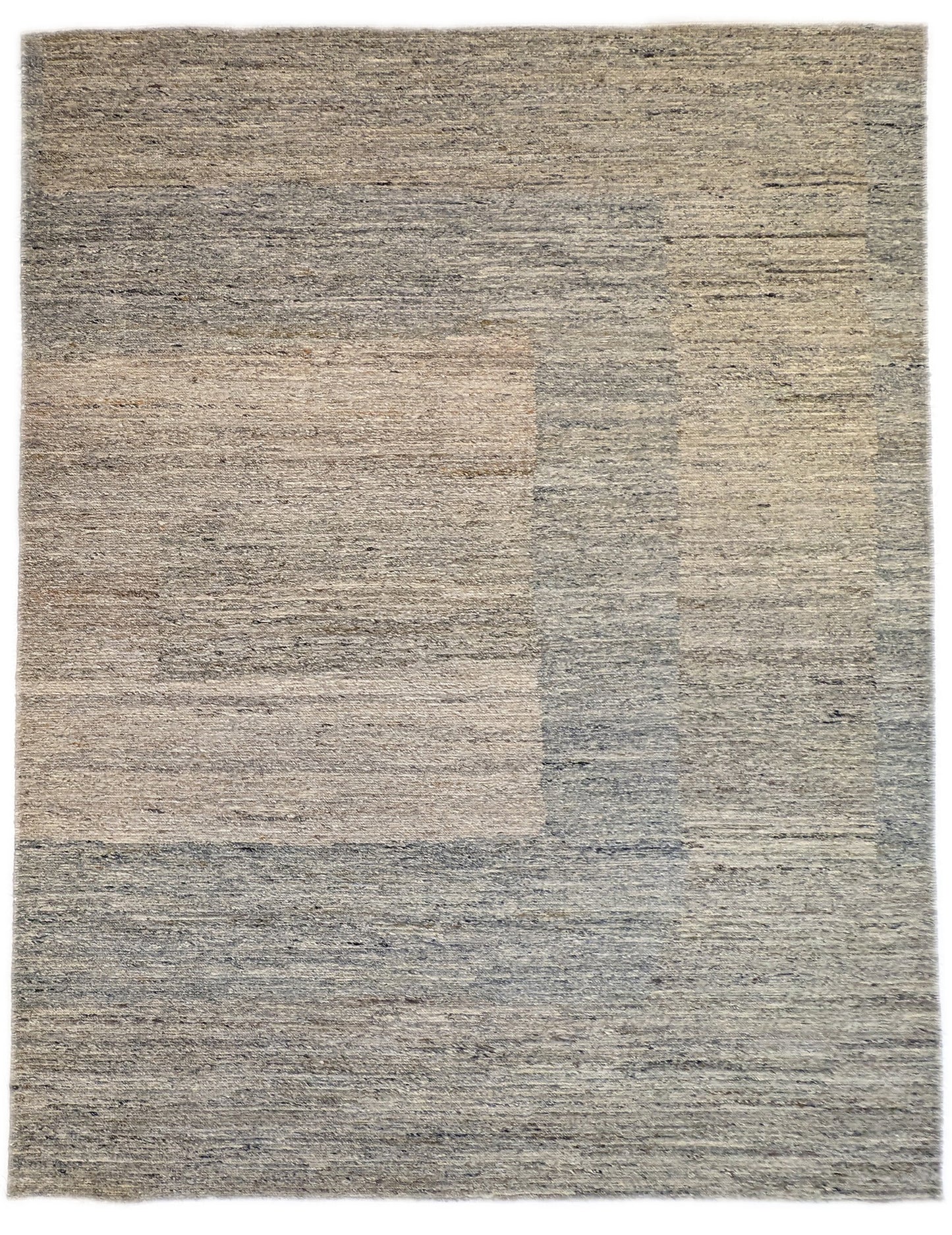 A hand-knotted wool rug with a coastal-inspired design in shades of light blue, beige, ivory, and brown. Cozy pile. 