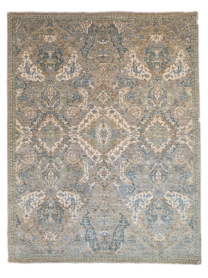 A hand-knotted wool rug featuring a traditional coastal lifestyle design with beige, blue, green, brown, gold, ivory, and grey colors.