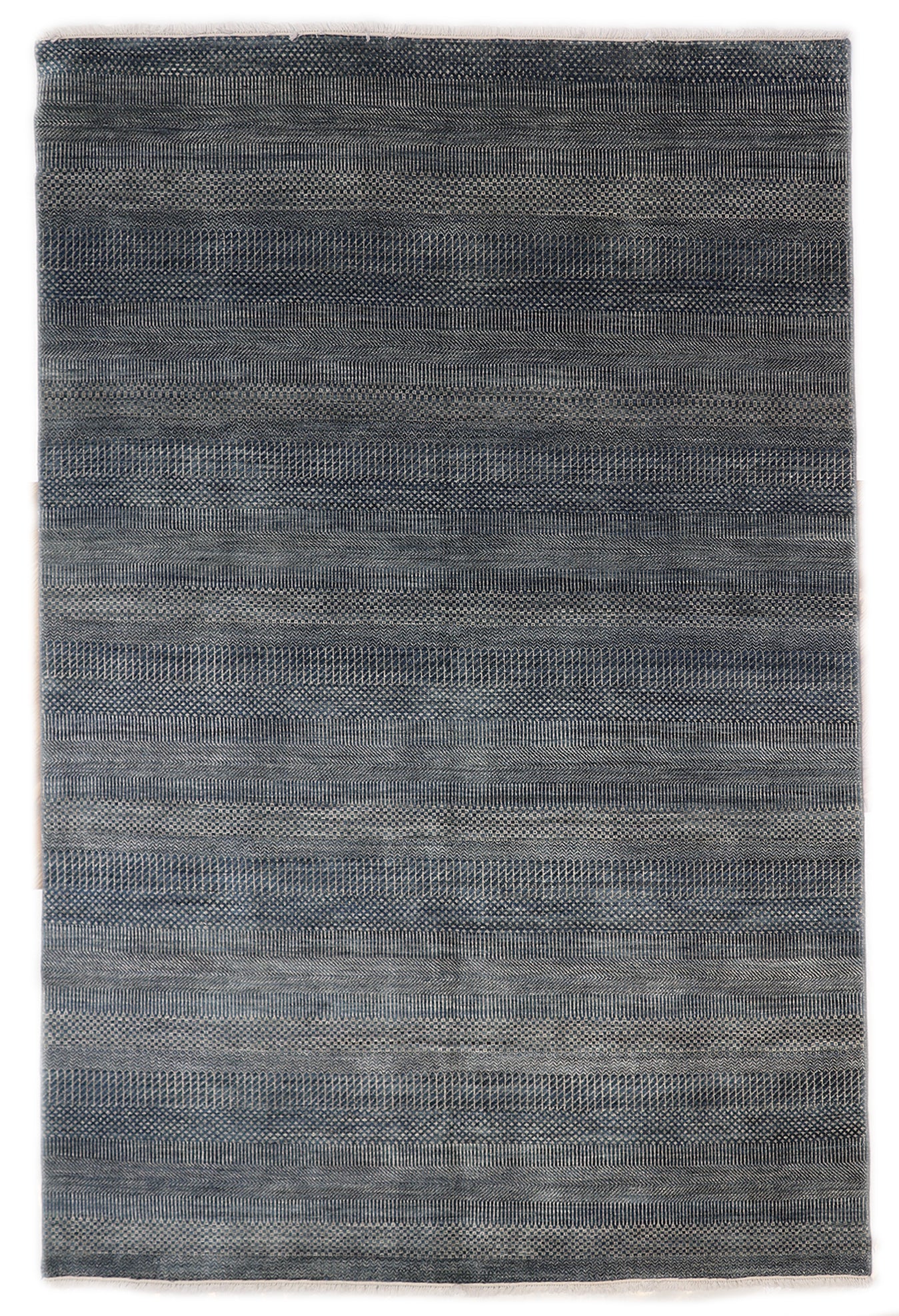 Hand-knotted  sandy beige and blue wool rug with a subtle blue net pattern and a cozy pile.