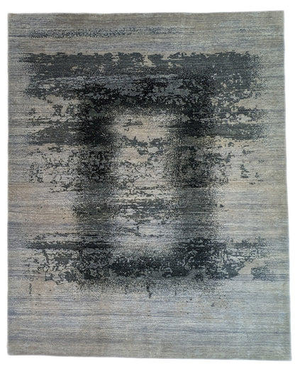 A hand-knotted rug with a serene coastal aesthetic featuring shades of gray, blue, and green, and a unique hand-knotted design. Cozy wool and luxurious silk. 