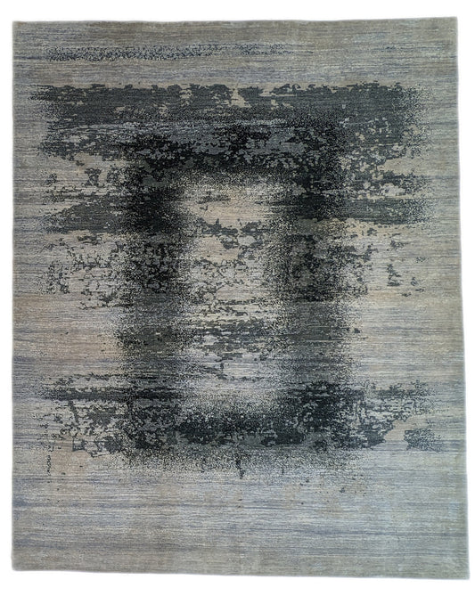 A hand-knotted rug with a serene coastal aesthetic featuring shades of gray, blue, and green, and a unique hand-knotted design. Cozy wool and luxurious silk. 