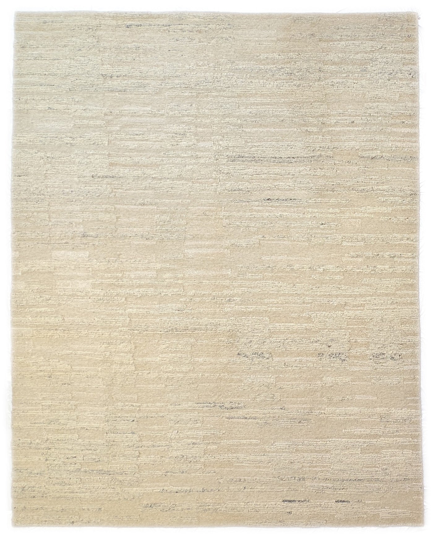 A beige hand-knotted rug with a coastal aesthetic from the Carmel-by-the-Sea Collection.