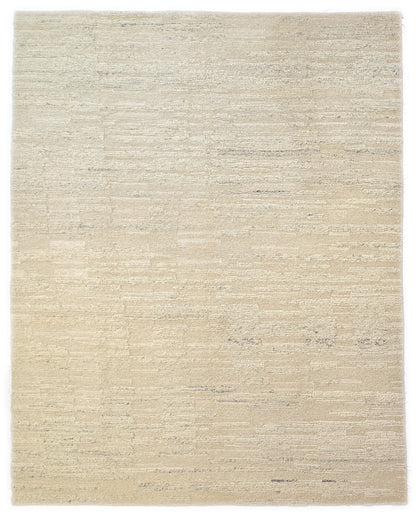 A beige hand-knotted rug with a coastal aesthetic from the Carmel-by-the-Sea Collection.