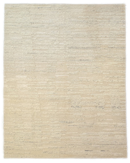 A beige hand-knotted rug with a coastal aesthetic from the Carmel-by-the-Sea Collection.