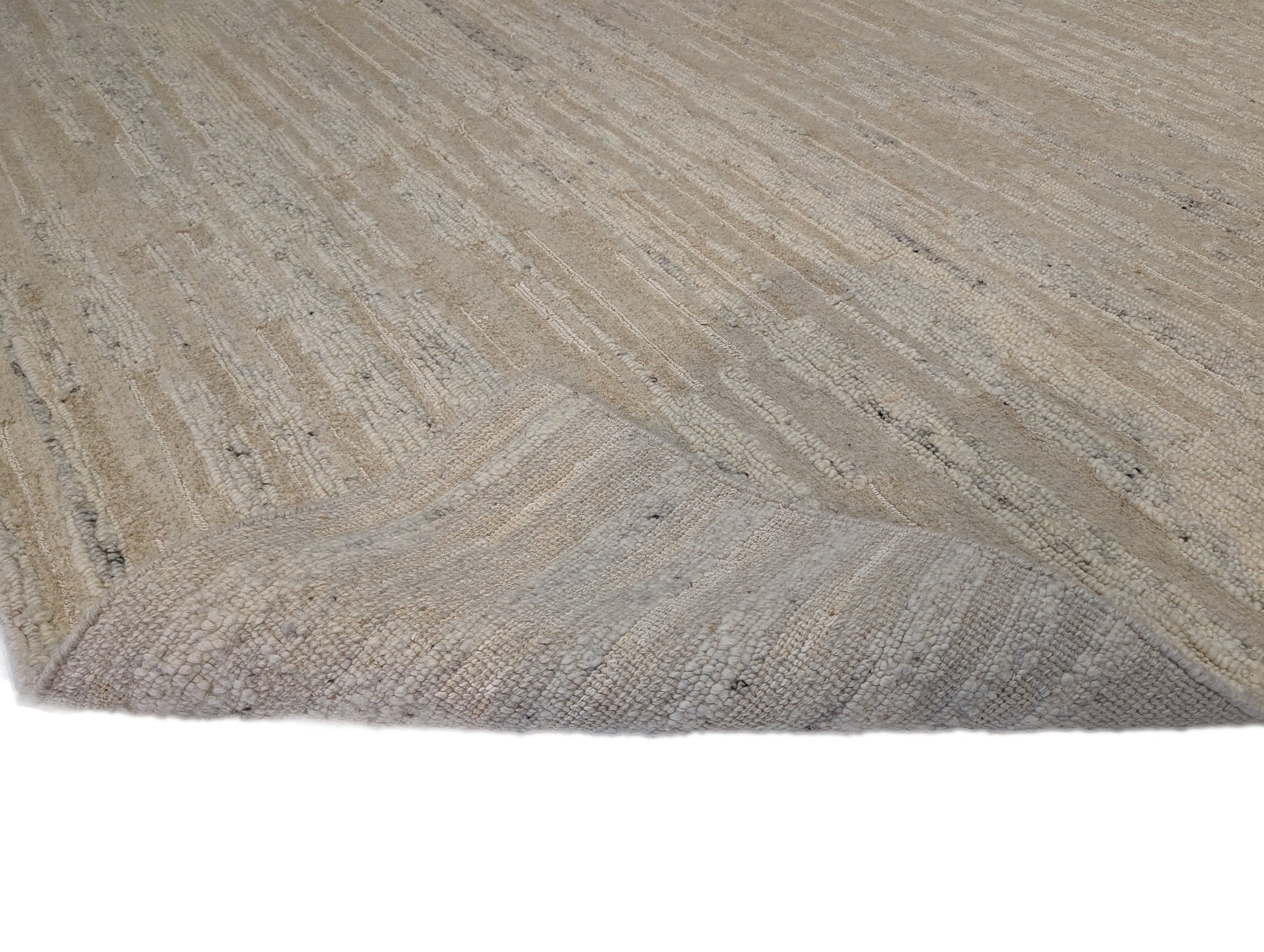 A beige hand-knotted rug with a coastal aesthetic from the Carmel-by-the-Sea Collection.