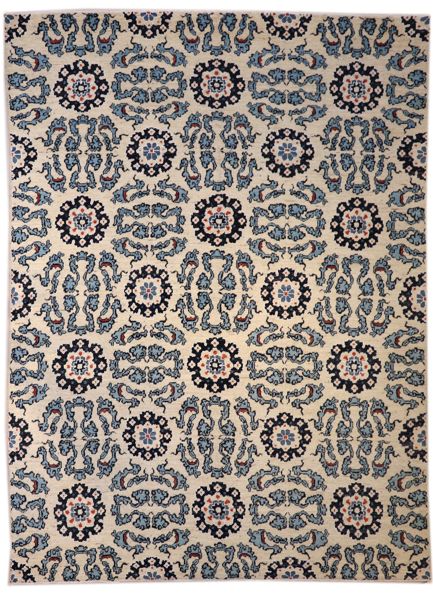 A hand-knotted rug with a coastal aesthetic, featuring a larger knot and higher pile. It has a vivid palette of turquoise, coral, and navy, with serene tones of ivory and white.