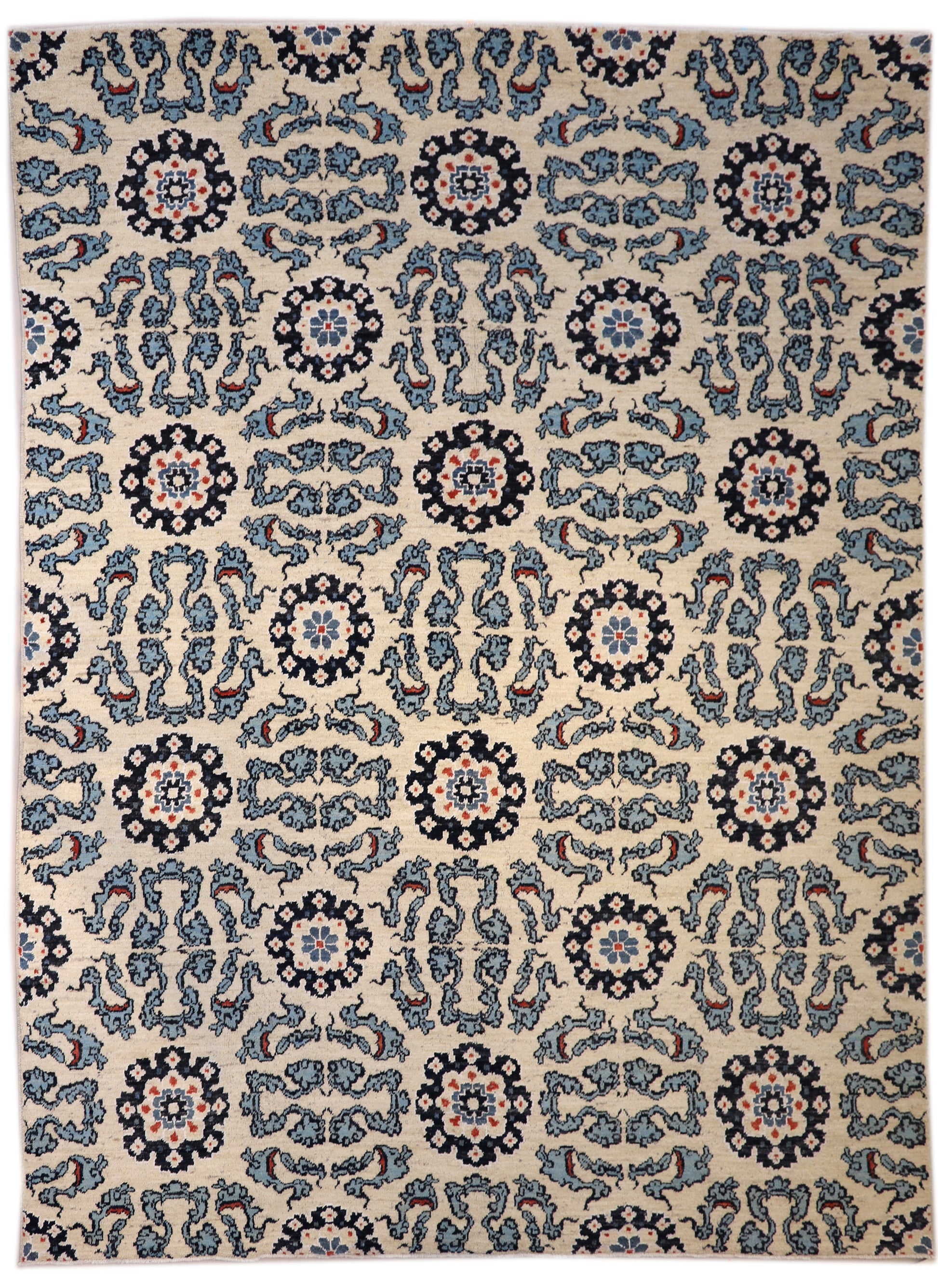 A hand-knotted rug with a coastal aesthetic, featuring a larger knot and higher pile. It has a vivid palette of turquoise, coral, and navy, with serene tones of ivory and white.