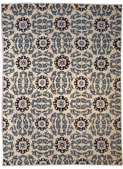 A hand-knotted rug with a coastal aesthetic, featuring a larger knot and higher pile. It has a vivid palette of turquoise, coral, and navy, with serene tones of ivory and white.