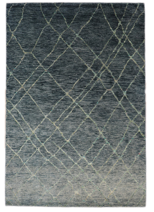 Handmade wool and recycled sari silk rug with a deep plush pile in ocean gray and blue with vibrant sea glass accents