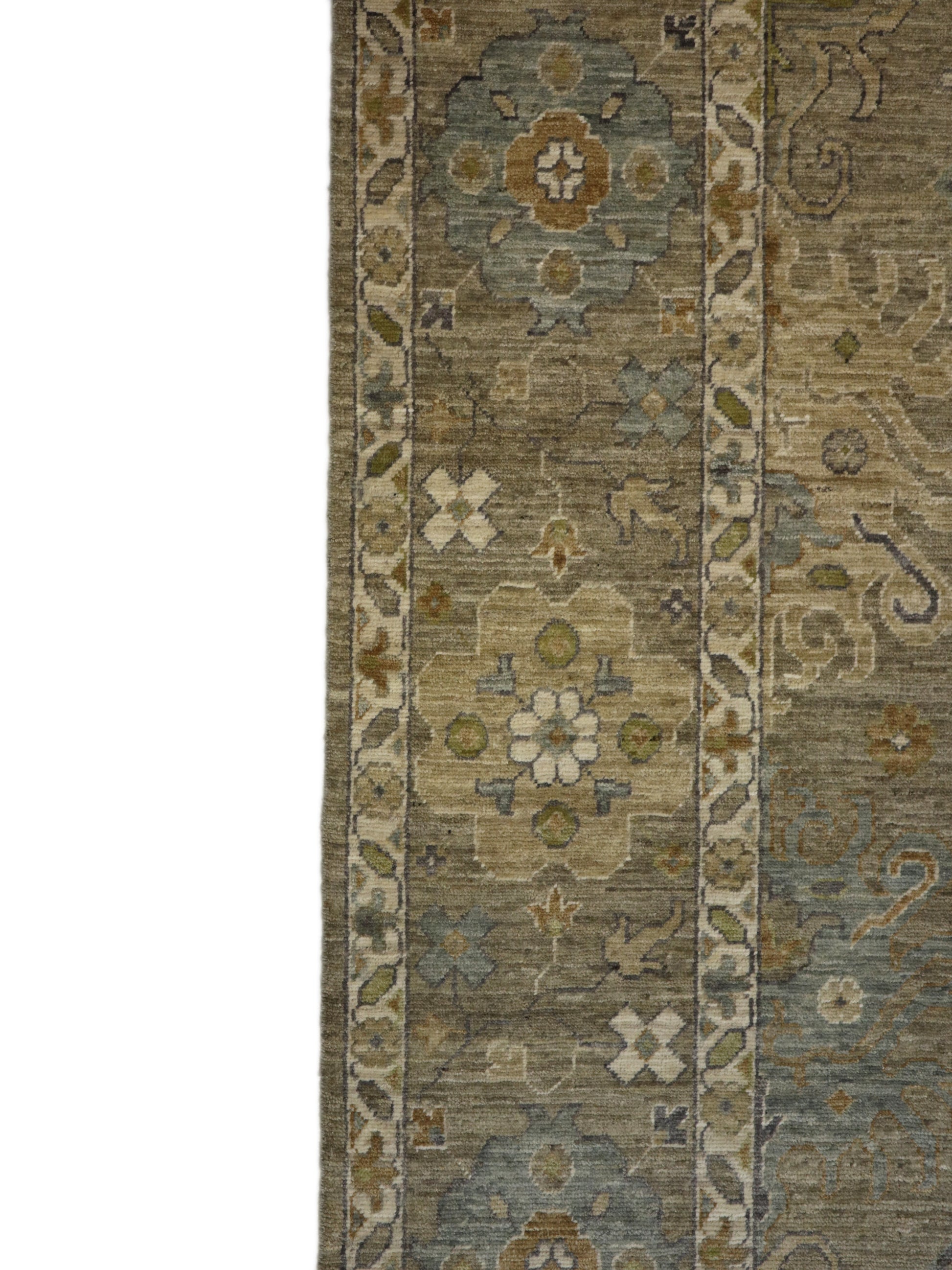 A hand-knotted wool rug with a coastal design in shades of grey, blue, ivory, brown, orange, green, and taupe.