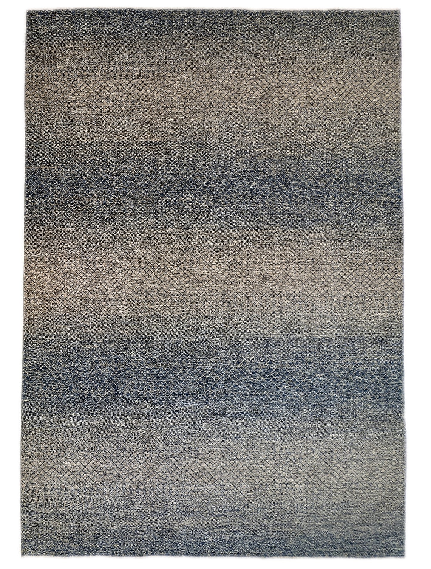 A hand-knotted wool rug with a net pattern in shades of beige, ivory, cream, and blue.