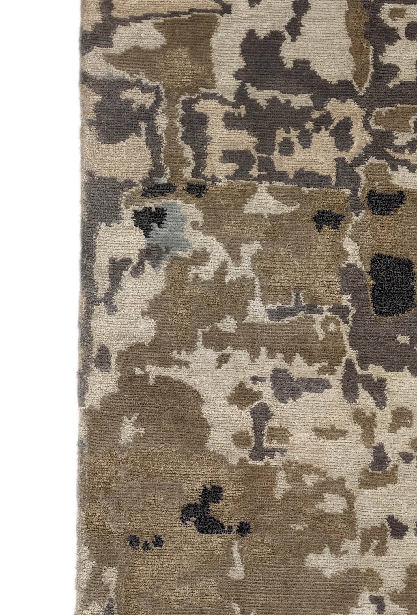 A luxurious coastal-themed rug featuring a blend of beige, gray, blue, and green colors with a textured and rugged texture. Wool and silk. 