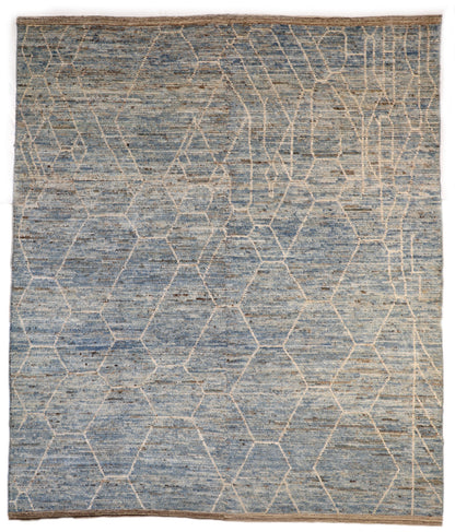 Hand-knotted geometric wool rug with a high pile and large knots in blue, ivory, beige, grey, and brown.