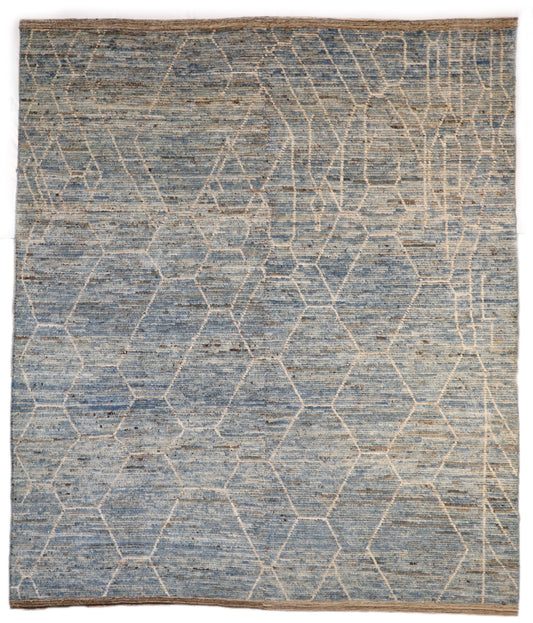 Hand-knotted geometric wool rug with a high pile and large knots in blue, ivory, beige, grey, and brown.