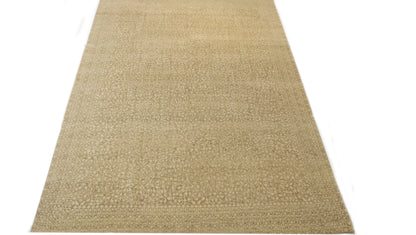Hand- knotted transitional rug with tones of beige and ivory. 