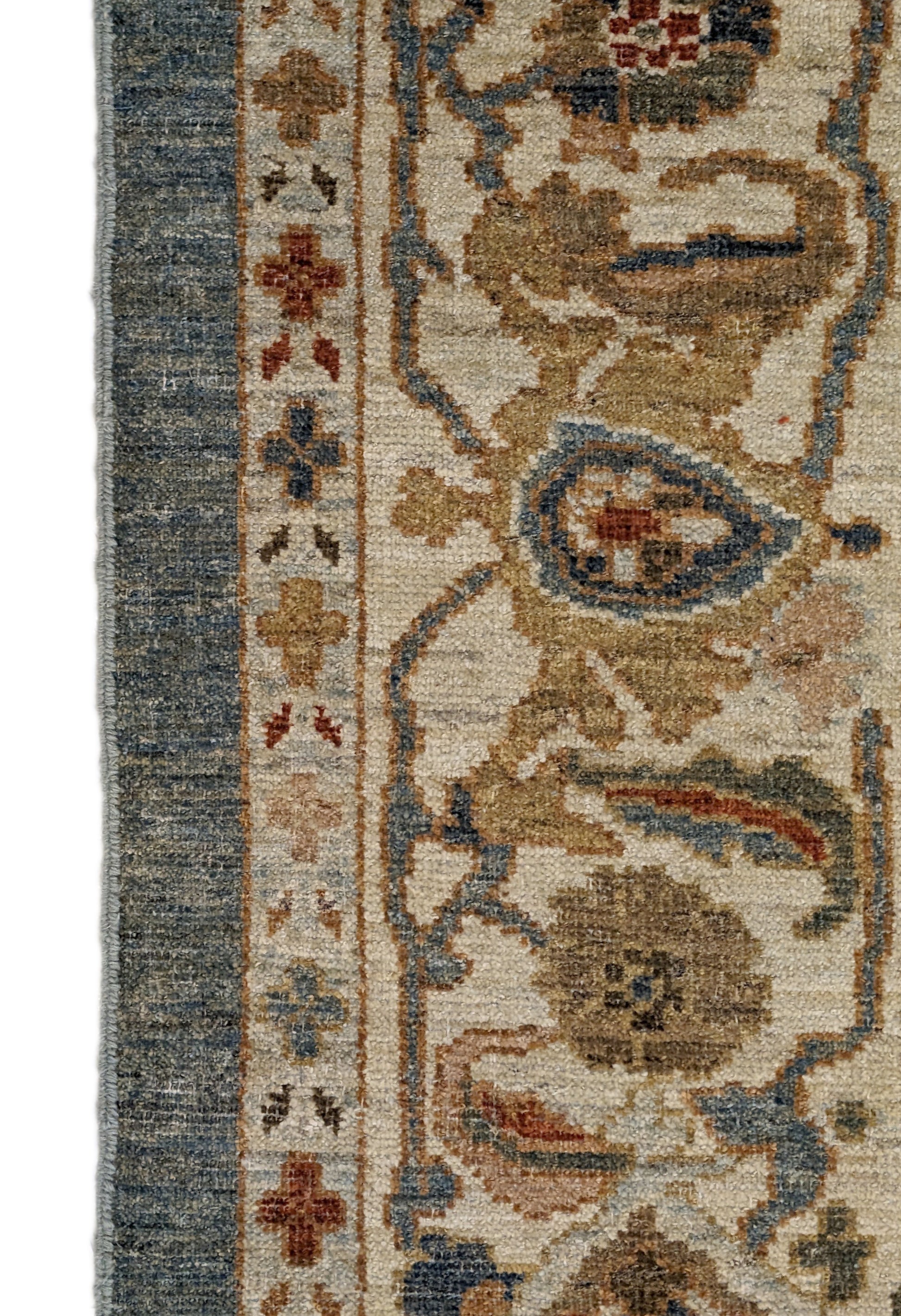 A hand-knotted wool rug with a traditional and contemporary design, featuring a luxurious color scheme of slate grey, red, gold, pink, blue, green, and beige. Low pile. 