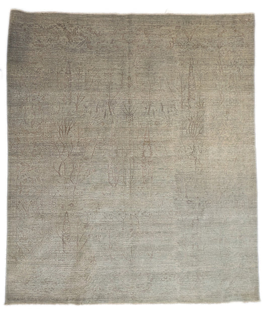 A beige hand-knotted rug, featuring a soft pink silk Tree of Life design and  lower pile height. 