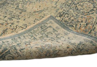 Hand- knotted decorative rug with a floral pattern in blue and beige tones 