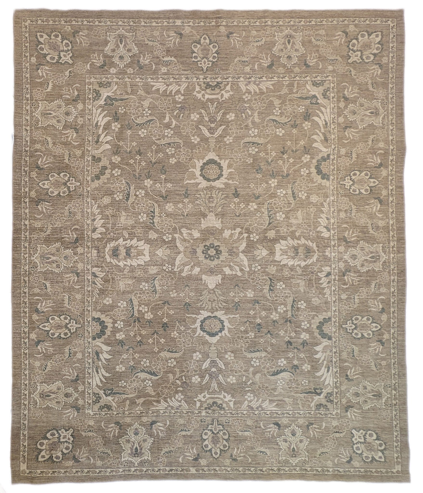 A hand-knotted wool rug with a traditional and coastal design in beige, brown, green, and other colors.